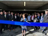 Tracy Bullock CEO cutting the ribbon to the new staff car park