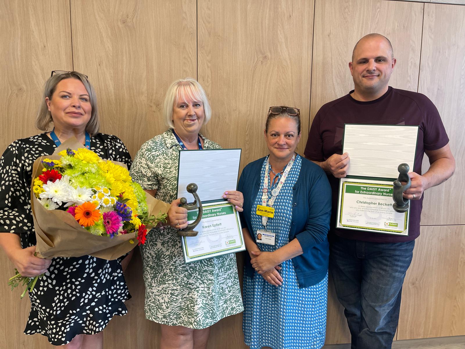 Chief Nurse Ann-Marie Riley with Daisy winners Chris and Karen