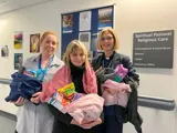 Chaplaincy team with winter care bags