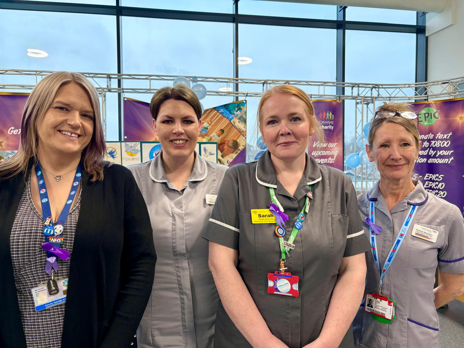 Four of the gastric cancer team standing together