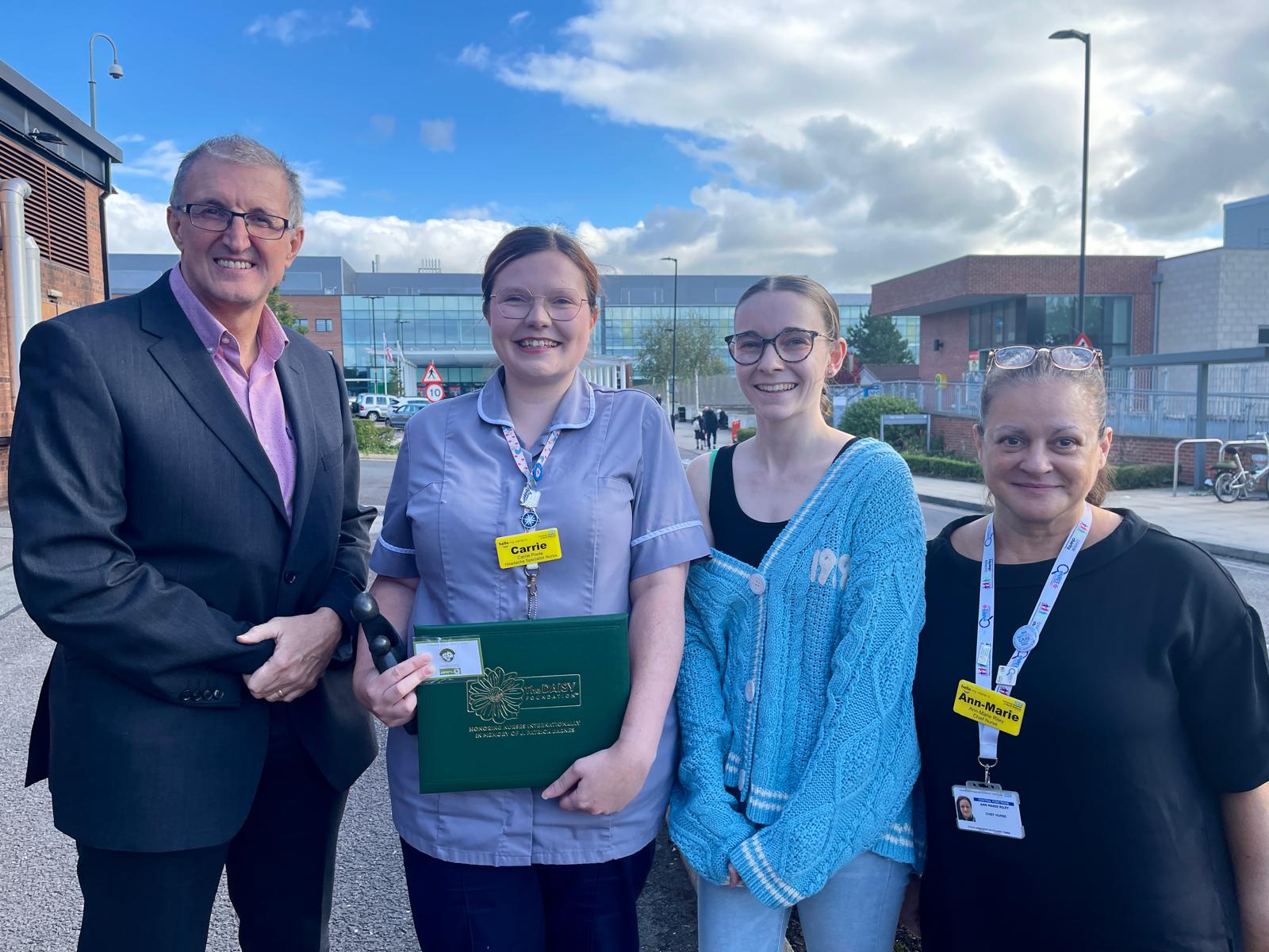 Patient Lucy, with headache nurse and chief nurse